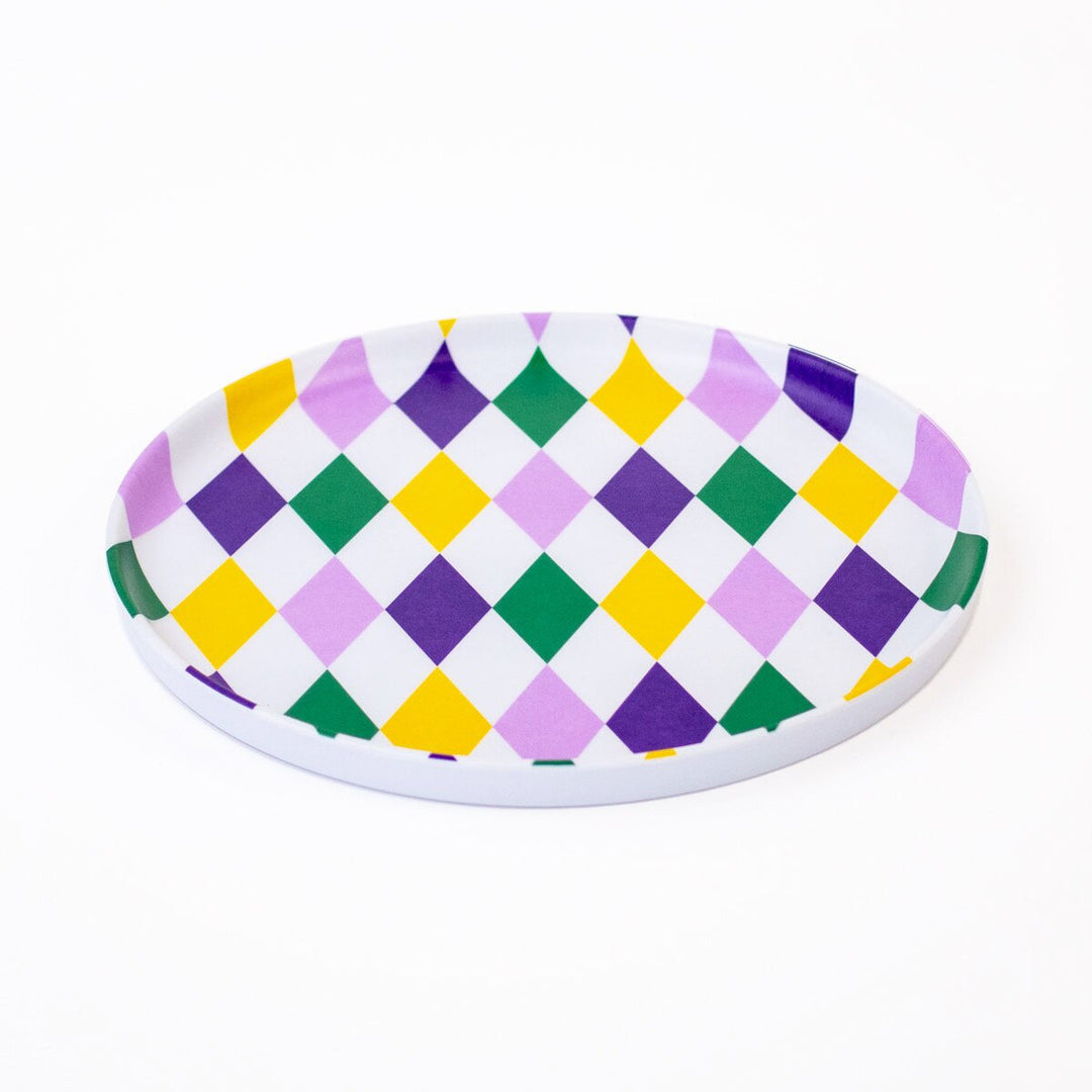 Melamine oval platter featuring an iconic Mardi Gras harlequin diamond pattern in vibrant shades of purple, yellow-gold, and emerald green displayed against a clean white background