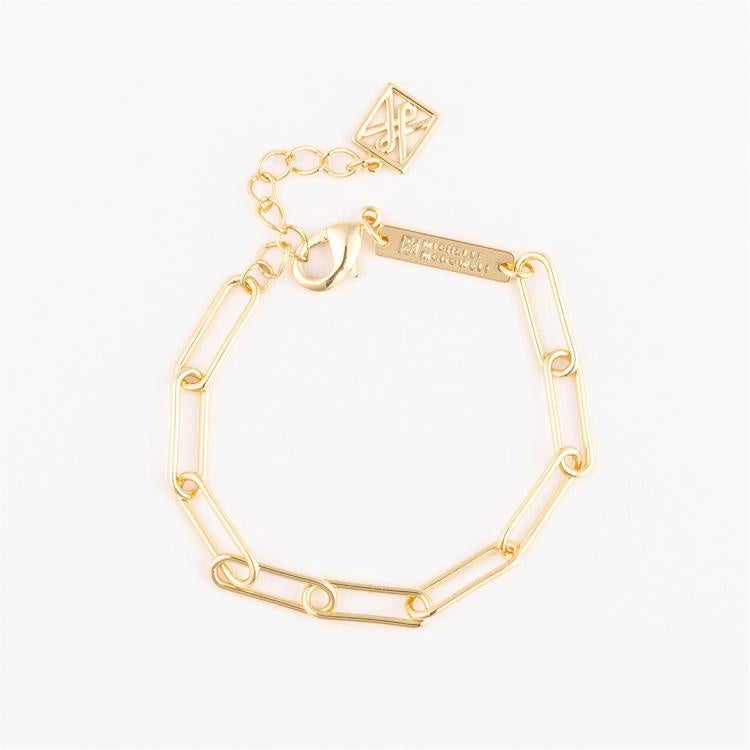 Gold-plated paperclip link bracelet by Madewell x Michele featuring elongated oval links, an adjustable lobster claw closure with an extension chain, and a signature square geometric logo charm on a clean white background