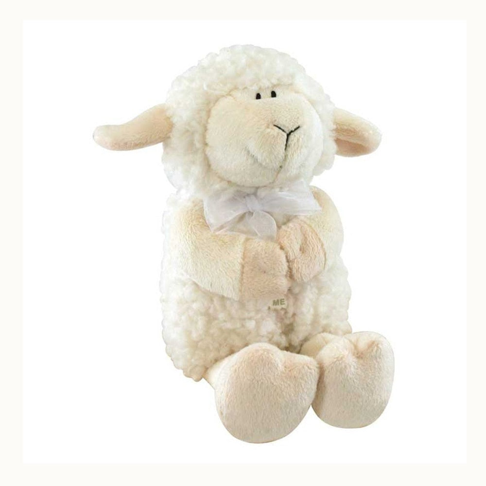 Plush stuffed animal by Russ Berrie of a creamy white lamb featuring curly textured fleece, a sheer organza bow, and paws folded in prayer against a white studio background