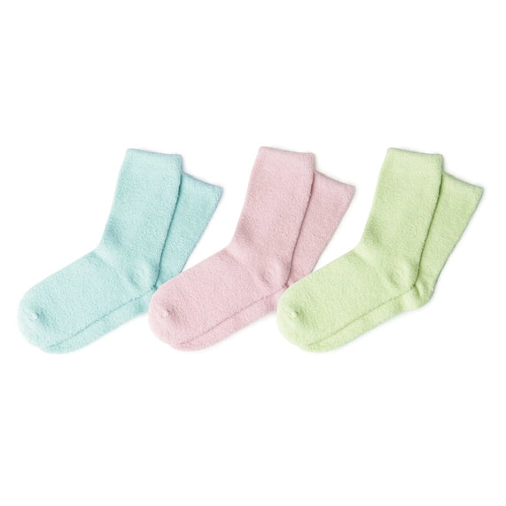 Product photograph of three pairs of fuzzy pastel socks in mint green, soft pink, and pale lime colors, showcasing a plush textured fabric arranged diagonally on a plain white background