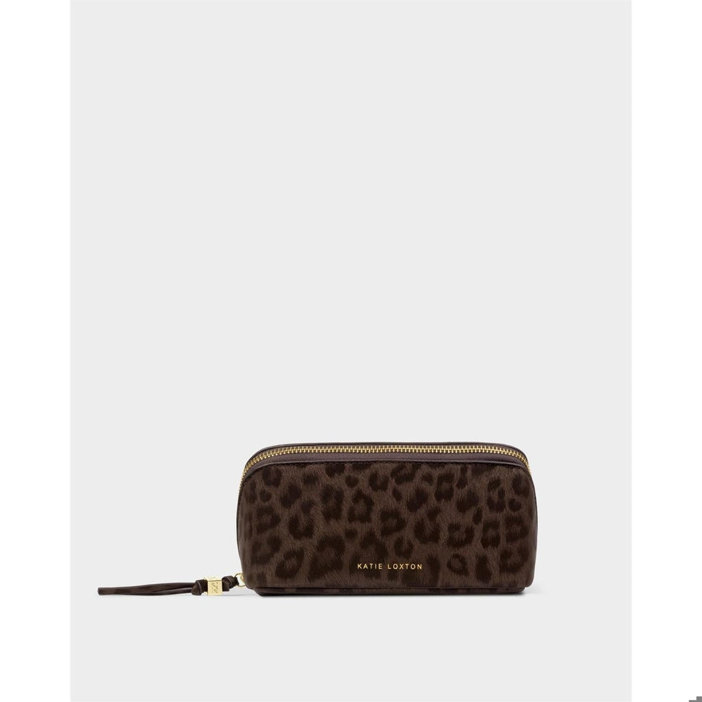 Textured leopard print makeup bag by Katie Loxton centered on a plain grey background featuring a gold-tone top zipper, debossed gold logo, and a dark brown leather-look tassel pull