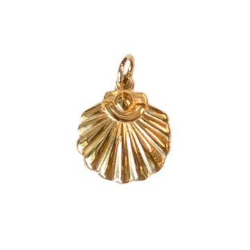 Gold jewelry scallop shell charm pendant isolated on a white background featuring distinct radial ridges, a highly polished reflective surface, and a small gold bail for attachment