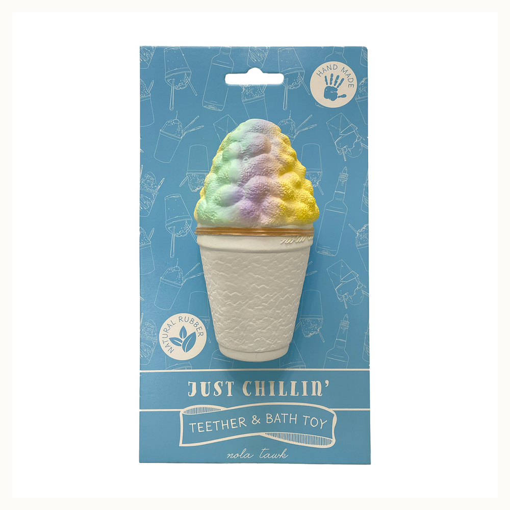 Natural rubber teether and bath toy by Nola Tawk featuring a New Orleans style snow cone with pastel green, purple, and yellow textured ice in a white cup on a blue Just Chillin themed backing card