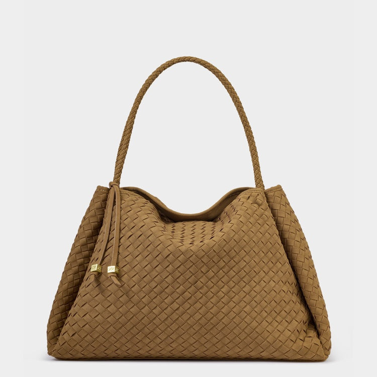 Woven leather handbag by Bottega Veneta showcasing the signature tan Intrecciato weave, a long braided shoulder strap, and polished gold-tone knot hardware against a neutral studio background