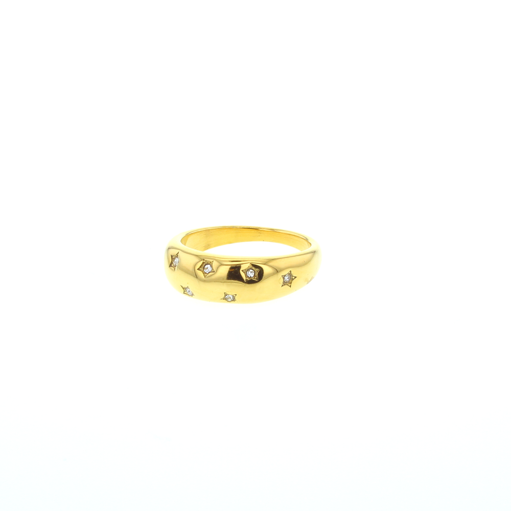 Yellow gold dome ring centered on a white background featuring celestial star-shaped engravings inset with clear crystals and a smooth polished finish