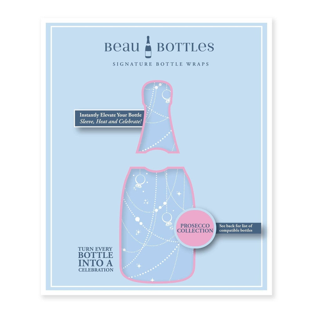 Digital graphic by Beau Bottles featuring a Prosecco Collection bottle wrap design with white diamond ring illustrations, sparkling beaded chains, and a pink-bordered silhouette on a light blue background