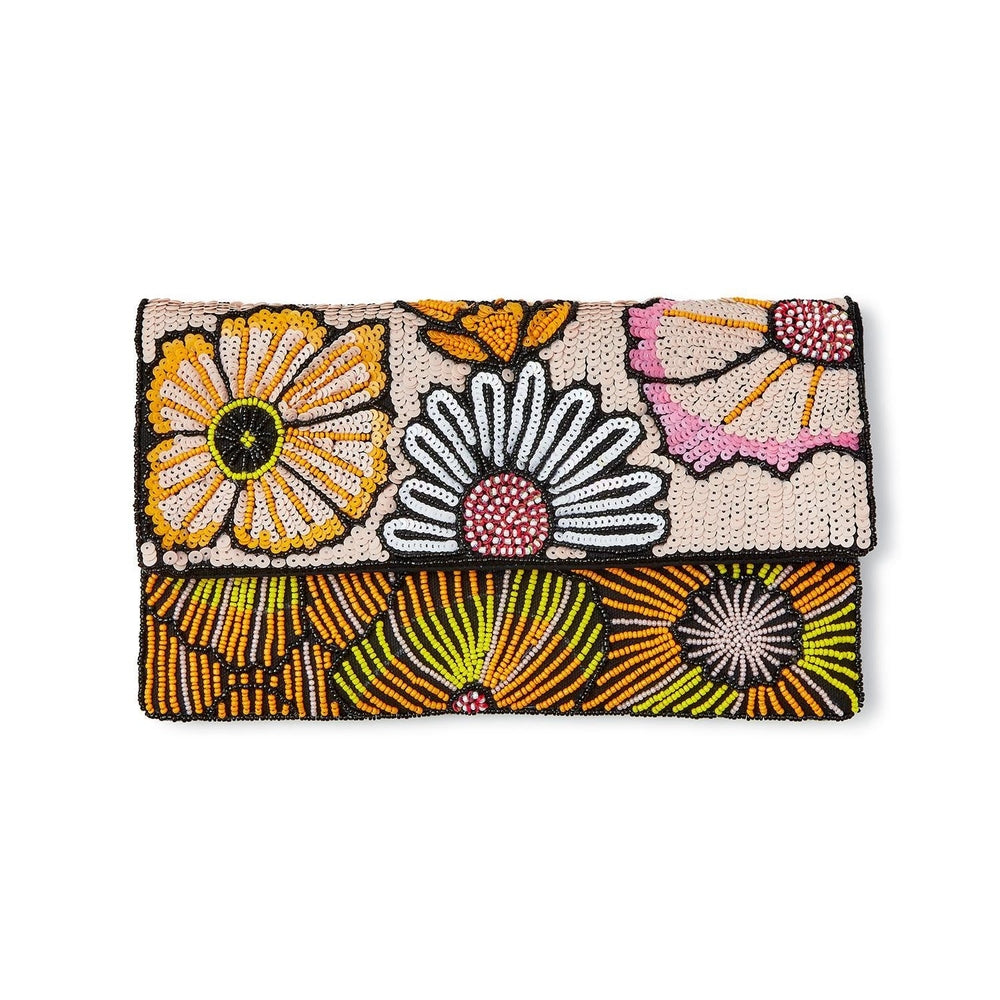 Hand-beaded and sequined envelope clutch bag featuring vibrant oversized floral motifs including a pink sequined blossom and a white daisy with a pink textured center against a plain white background