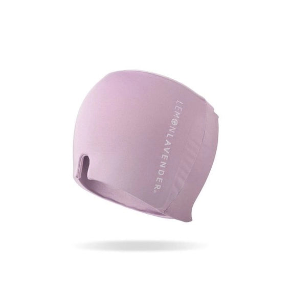 Product photograph by Lemon Lavender of a soft lavender head wrap on a plain white background featuring vertical white brand lettering and a functional U-shaped cutout notch at the base