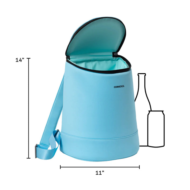 Product photography by Corkcicle of a light blue insulated backpack cooler on a white background featuring an open lid, adjustable straps, and scale outlines of a wine bottle and can with dimension indicators for height and width