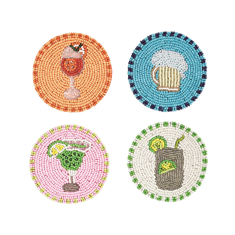 Hand-beaded glass coasters featuring a set of four vibrant beverage designs including a frothy beer mug on blue and a lime-garnished margarita on pink with circular patterns of colorful seed beads isolated on a white background