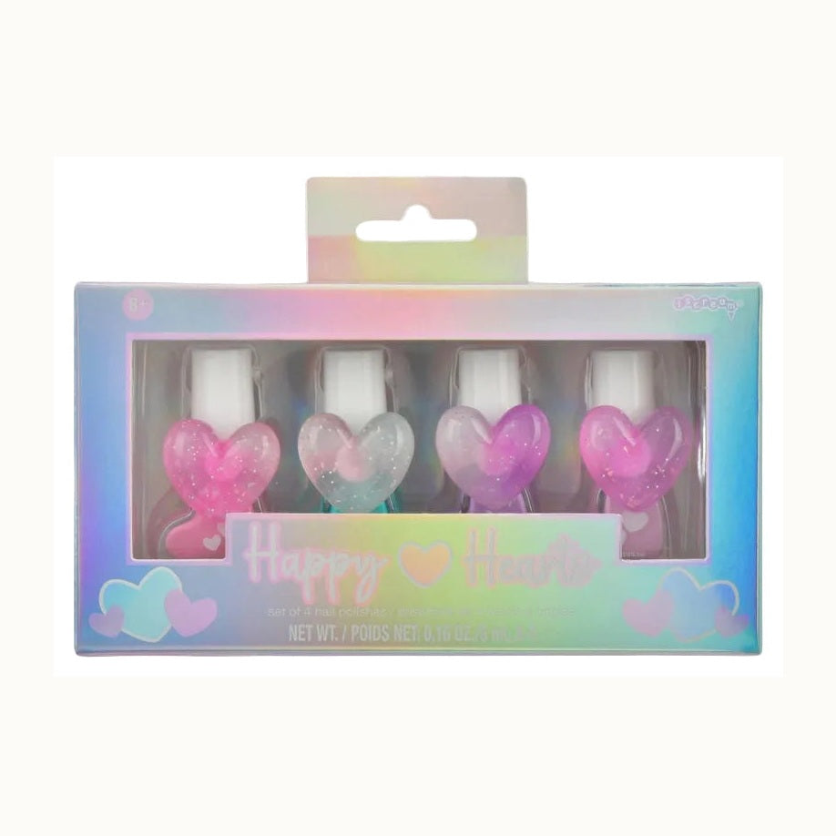 Commercial product photography for Iscream of a Happy Hearts set of four nail polishes featuring large glittery heart-shaped caps in sparkling pink and purple shades inside a holographic iridescent window box