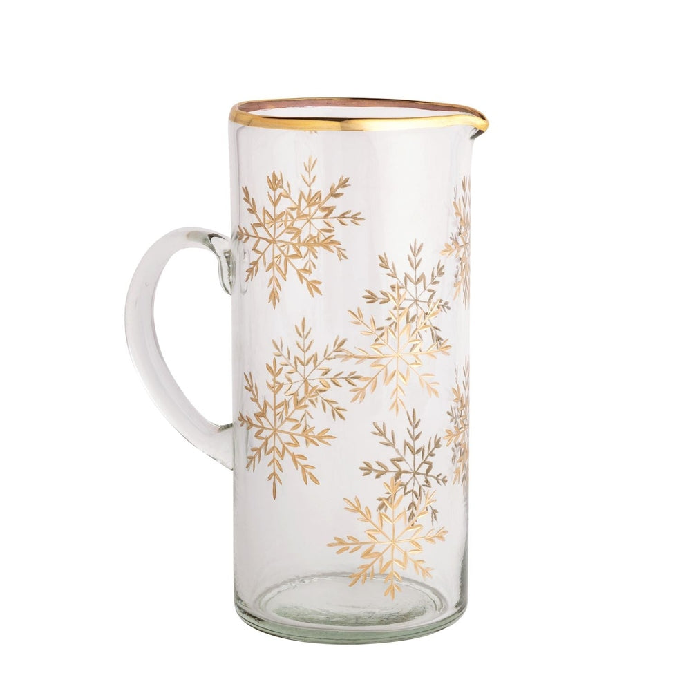 Glassware clear cylindrical pitcher featuring metallic gold snowflake motifs and a gilded rim set against a clean white background