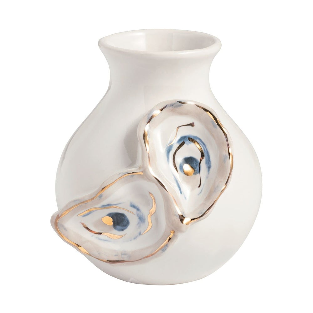 Ceramic bud vase by Grit &amp; Grace Studio featuring two sculpted oyster shell motifs with gold gilded rims and blue watercolor interior accents against a white background