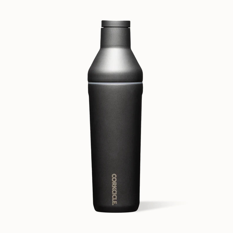 Studio product photograph by Corkcicle of a matte gunmetal canteen featuring a vertical brand logo, flat-sided ergonomic design, and a sleek tapered neck centered against a solid black background