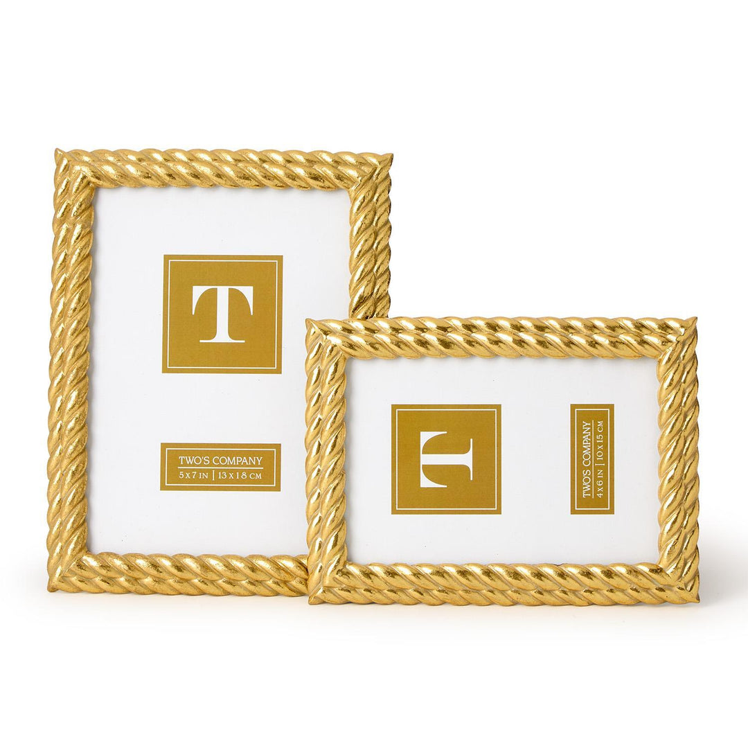 Gold-toned picture frames by Two&
