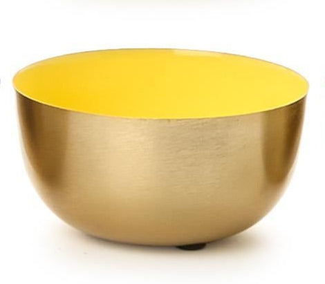 Enameled steel Krenit bowl by Herbert Krenchel featuring a brushed gold exterior and a vibrant yellow interior resting on a small black base against a plain white studio background