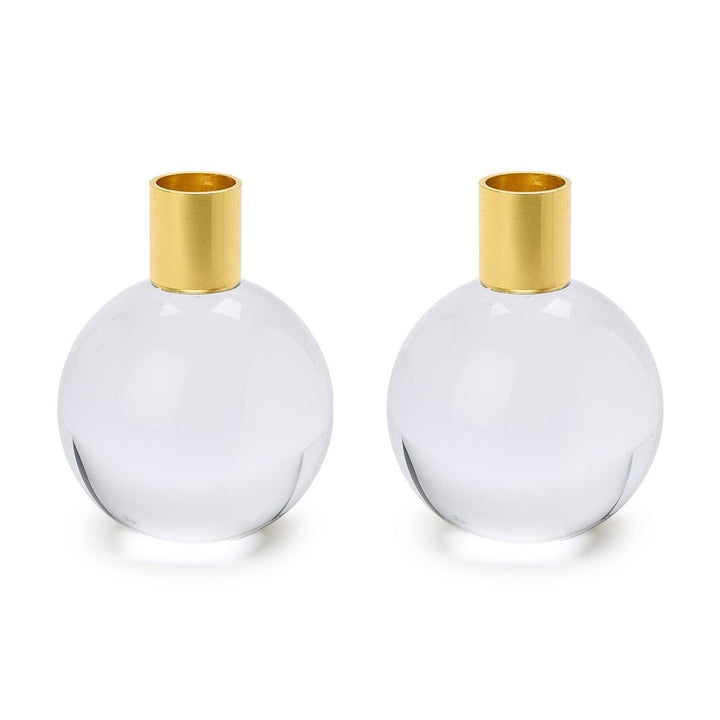 Crystal and brushed gold metal pair of contemporary spherical candle holders featuring transparent glass orbs and cylindrical gold-finished collars against a plain white background