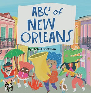 Digital illustration by Nichól Brinkman of the ABC's of New Orleans book cover depicting a whimsical jazz parade in the French Quarter with historic wrought-iron balconies, a green alligator playing a trumpet, and a blue-haired musician with a giant yellow tuba