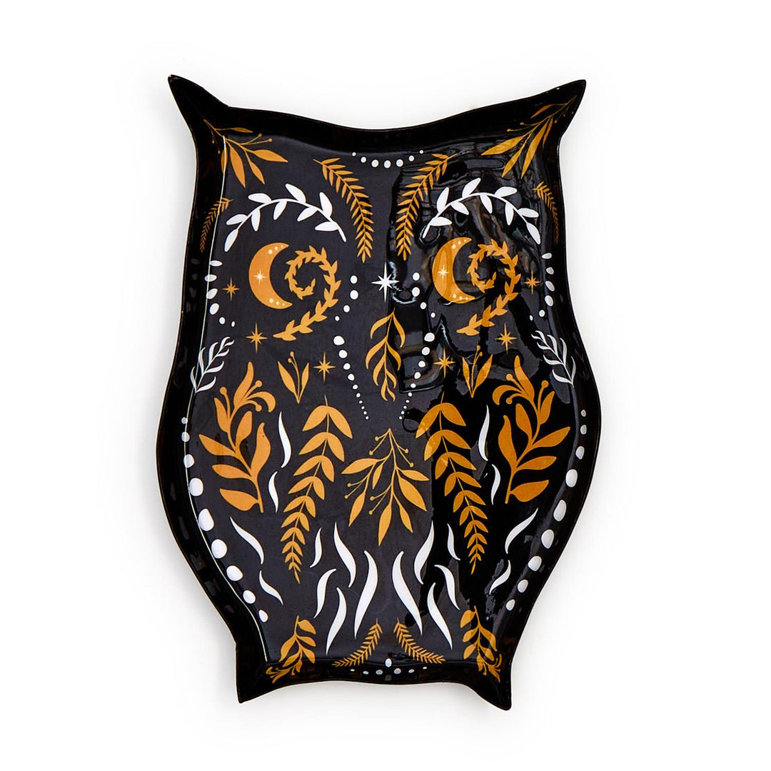 Ceramic owl-shaped decorative tray on a white background featuring celestial crescent moon eyes, intricate gold botanical leaf patterns, and white dotted highlights