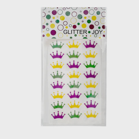 Adhesive sticker sheet by Glitter Joy featuring twenty-four vibrant purple, green, and yellow crown shapes arranged in rows beneath a colorful polka dot header card and brand name