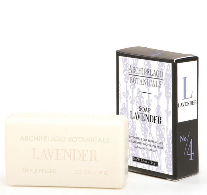 Product photography of Archipelago Botanicals lavender soap and its packaging on a white background featuring a cream-colored embossed bar, light purple botanical illustrations, and a large number 4 logo