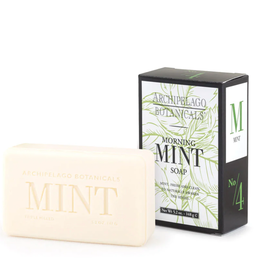 Product photograph by Archipelago Botanicals featuring a bar of Morning Mint soap next to its box on a white background, highlighting the embossed cream-colored bar, green botanical illustrations, and bold No. 4 branding