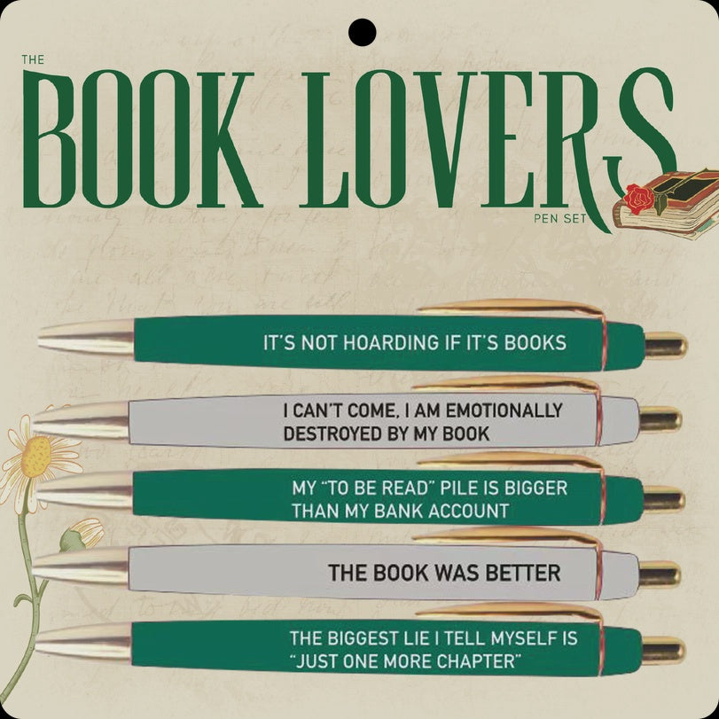 Product graphic of The Book Lovers Pen Set featuring five emerald green and silver pens with gold-toned clips and humorous literary quotes displayed on a vintage-style backing card with a red rose and a yellow daisy flower