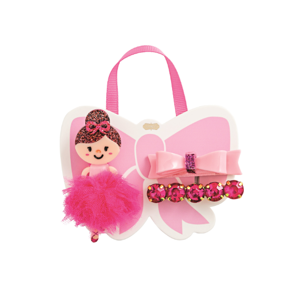Hair accessory gift set by Mimi and Lula featuring a ballerina with a fuchsia tulle tutu and glittery bun displayed on a butterfly-shaped card with a pink bow and five fuchsia rhinestones