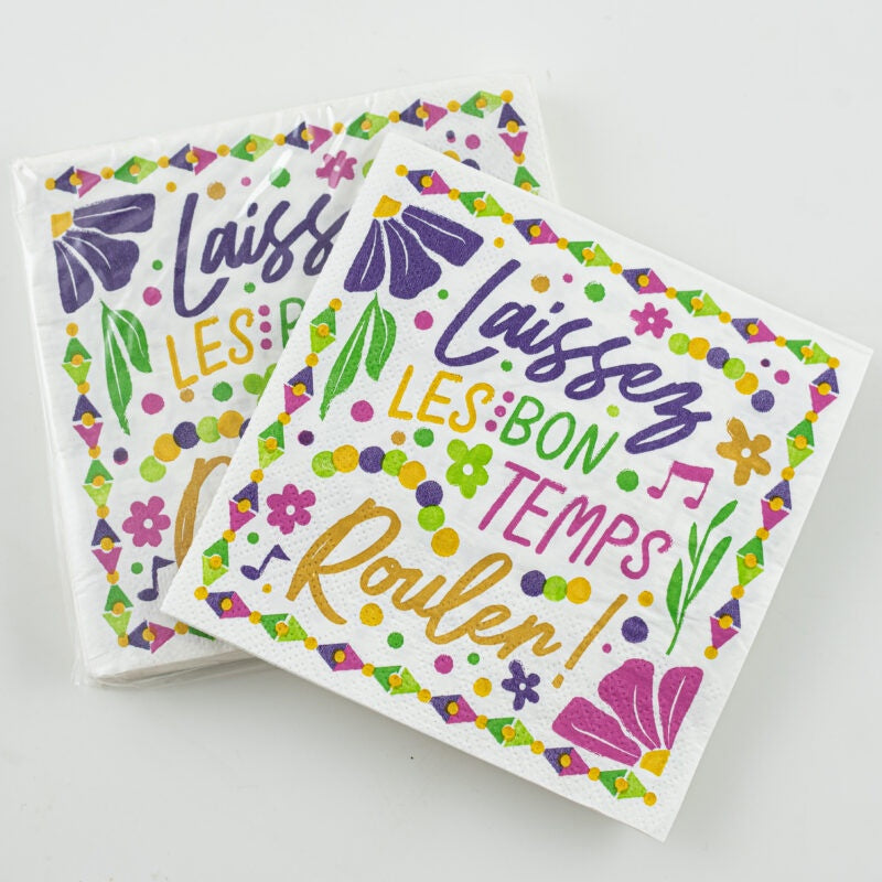 Printed paper napkins featuring the iconic New Orleans Mardi Gras phrase Laissez Les Bons Temps Rouler with purple flowers gold cursive script and a multicolored diamond patterned border