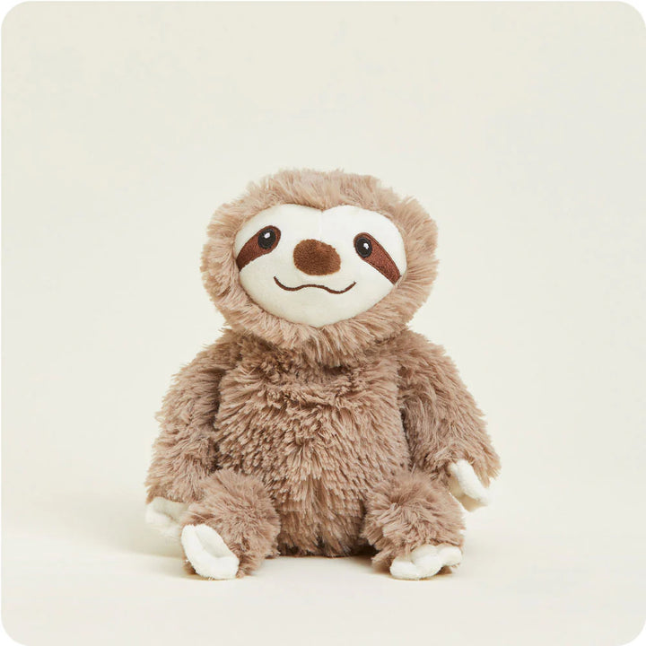 Plush stuffed toy sloth sitting against a plain white background featuring shaggy light brown fur, a cream-colored face with dark brown eye patches, and white felt claws