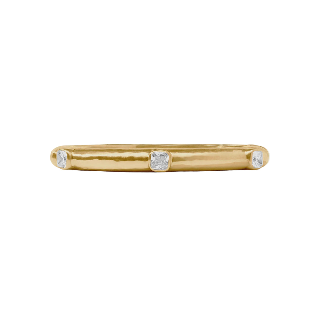 Handcrafted gold jewelry piece featuring a textured hammered yellow gold band accented by three square-cut white diamonds centered on a plain white background