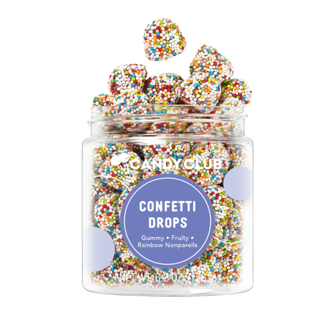 Product photograph by Candy Club of a clear jar filled with Confetti Drops gummy candies coated in vibrant rainbow nonpareils with several pieces suspended in mid-air above the purple circular label