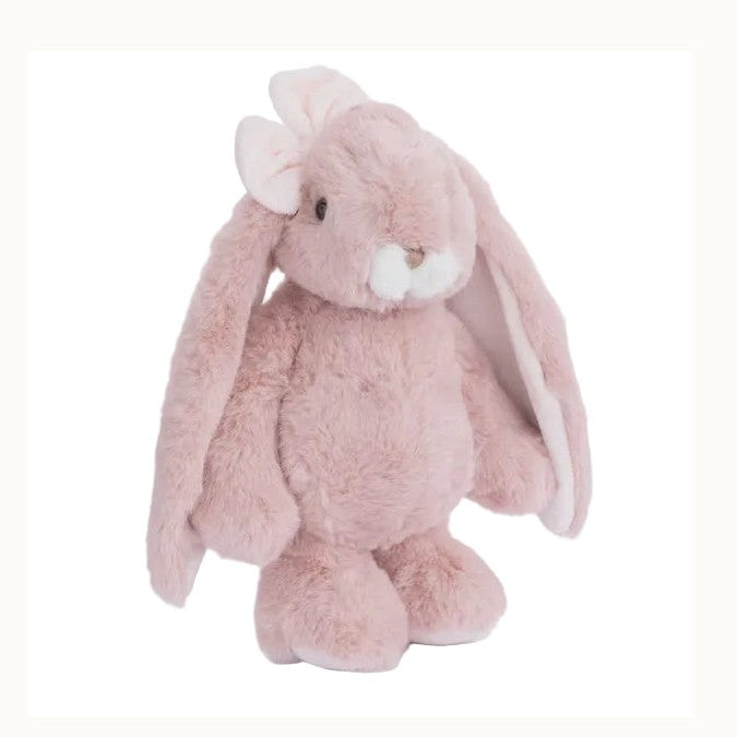 Plush toy bunny rabbit in a dusty pink hue featuring long floppy ears, a decorative cream-colored bow, and a soft white muzzle on a plain white background
