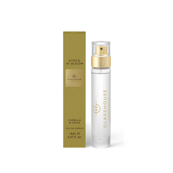 Product photograph by Glasshouse Fragrances of the Kyoto in Bloom Eau de Parfum featuring a slim 14mL glass spray bottle with a gold-toned atomizer standing beside a muted olive green box with gold foil branding and Camellia and Lotus text