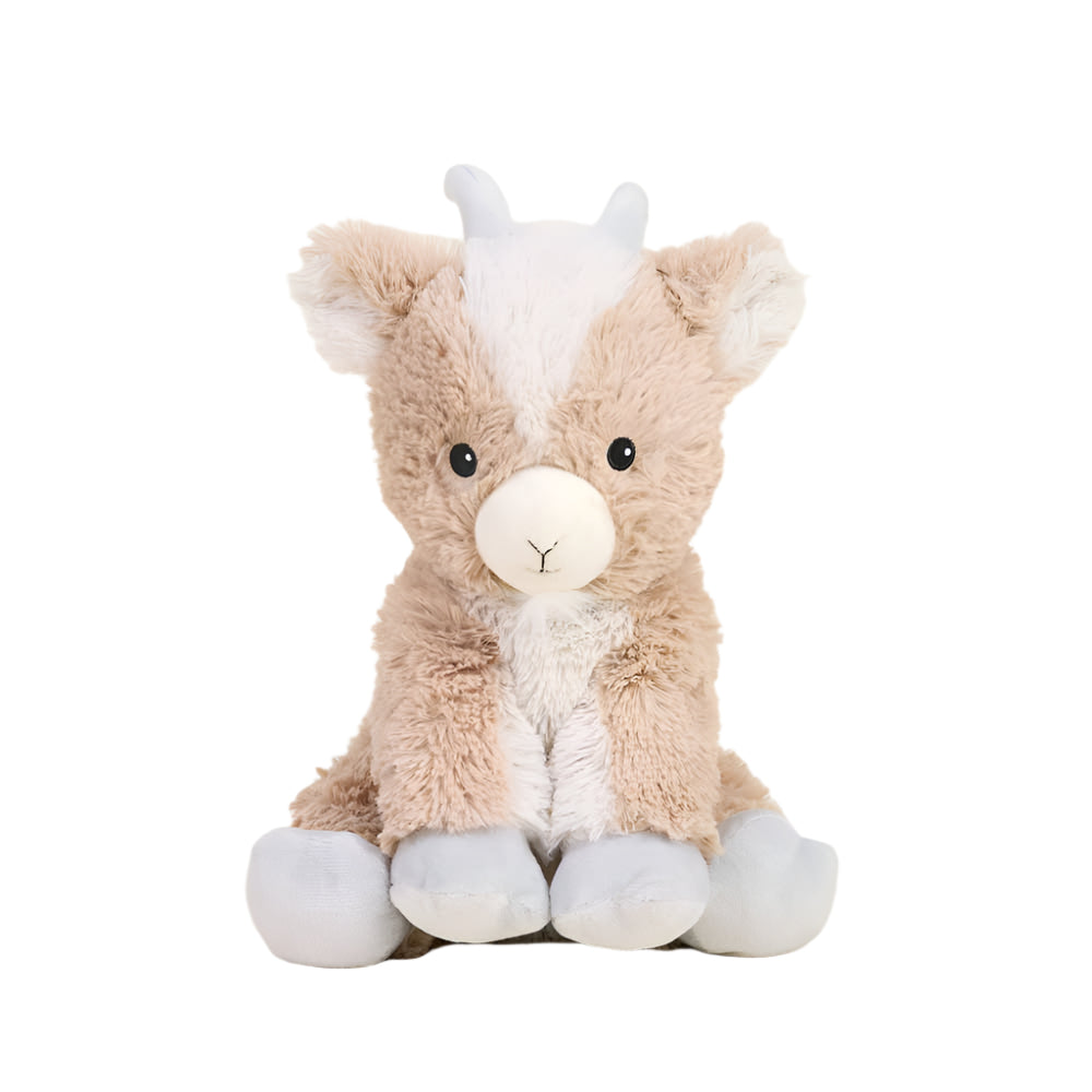 Soft plush toy of a baby goat sitting against a white background featuring fluffy tan and cream fur, tiny white horns, and a stitched Y-shaped nose