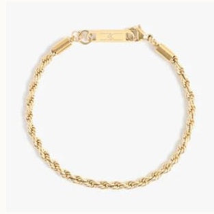 Gold rope chain bracelet featuring a textured twisted-link design, a rectangular gold bar clasp with an engraved logo, and polished cylindrical end caps on a white studio background