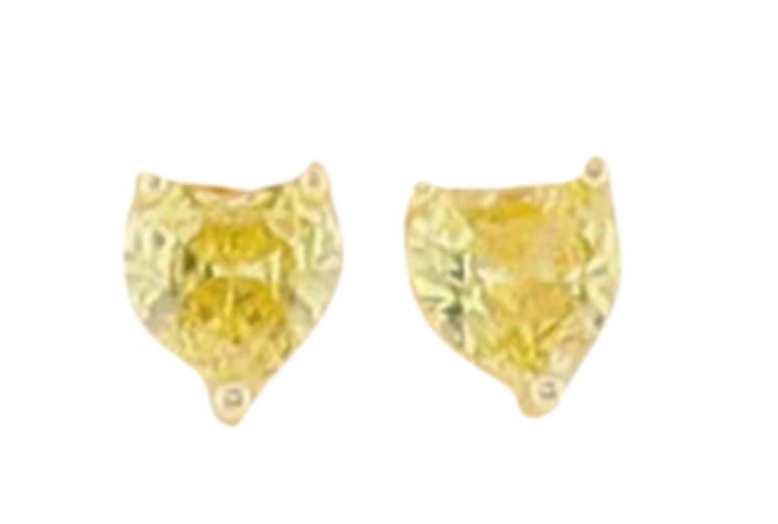 Jewelry featuring a pair of faceted heart-shaped yellow gemstone stud earrings with a vibrant citrus hue held in gold three-prong settings against a plain white background