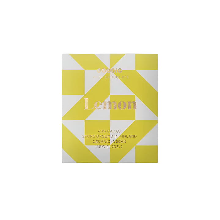 Graphic design by Goodio of a lemon craft chocolate bar from Finland featuring a vibrant yellow and white geometric pattern and elegant rose gold foil typography highlighting its organic and vegan status