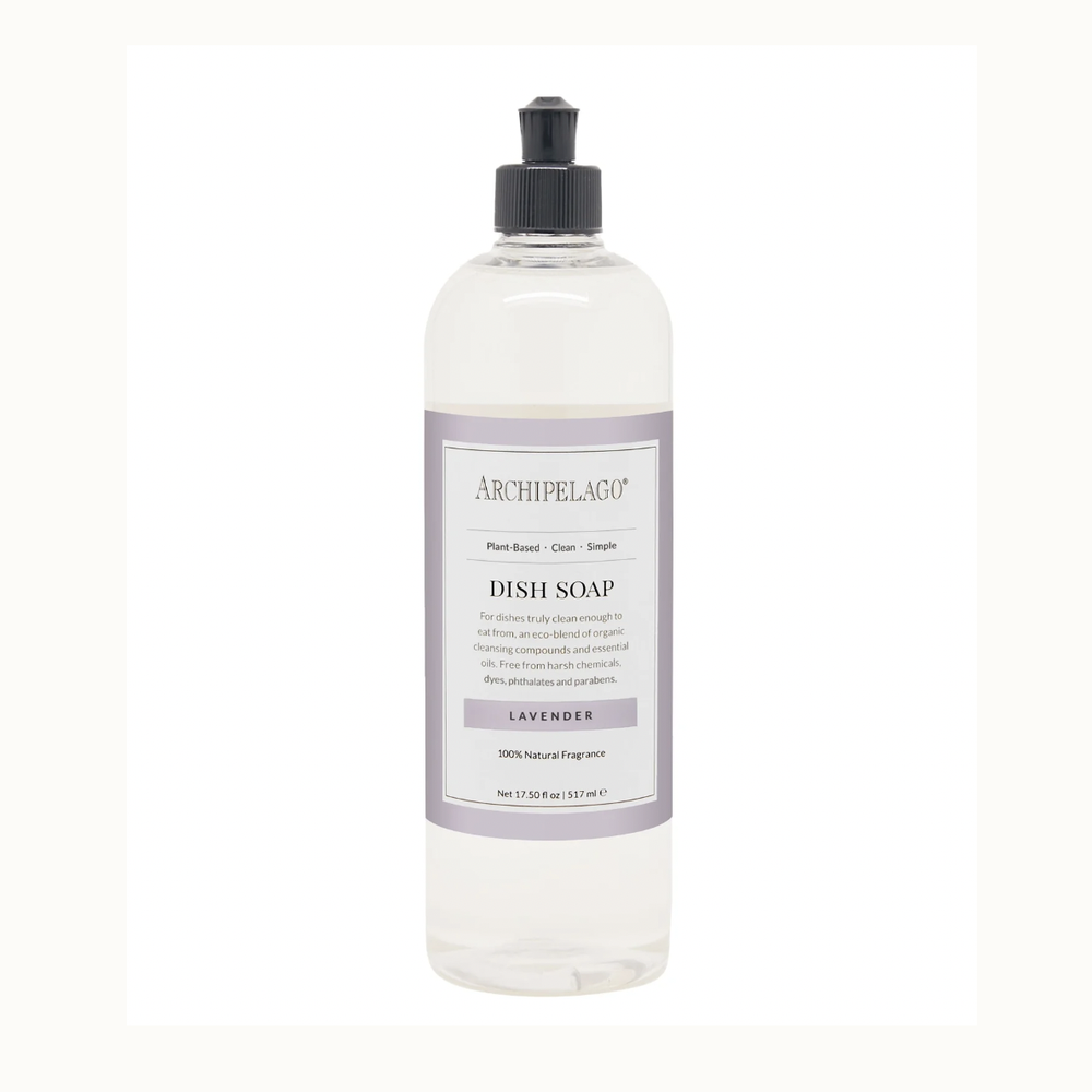 Studio photograph by Archipelago of a Lavender Dish Soap bottle on a white background showcasing the black pull-top nozzle, clear liquid, and the brand logo on a minimalist light purple label