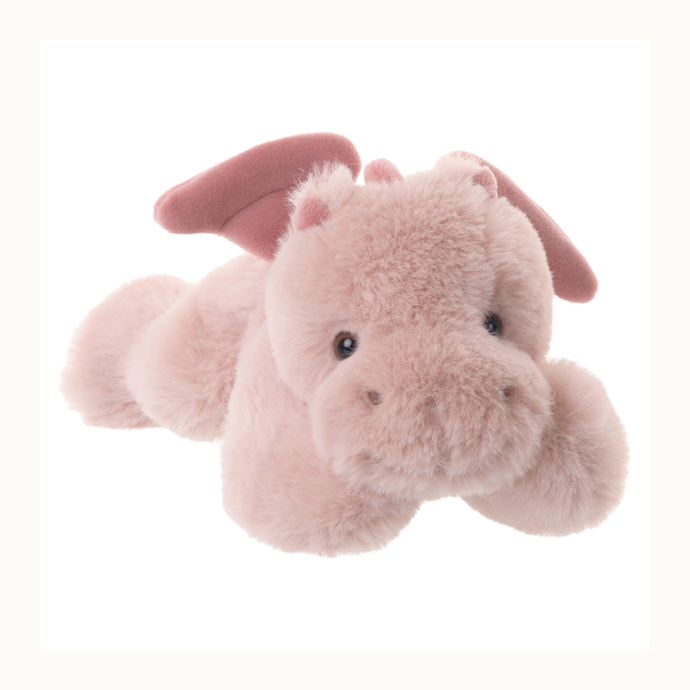 Plush toy by Jellycat of a rose-colored dragon lying flat on a white background featuring soft textured fur, suedey pink wings, and small dark bead eyes