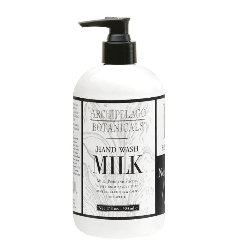 Product photograph by Archipelago Botanicals of their Milk Hand Wash bottle on a white background featuring a sleek black pump dispenser, elegant grey swirling patterns on the label, and the iconic bold black MILK brand logo