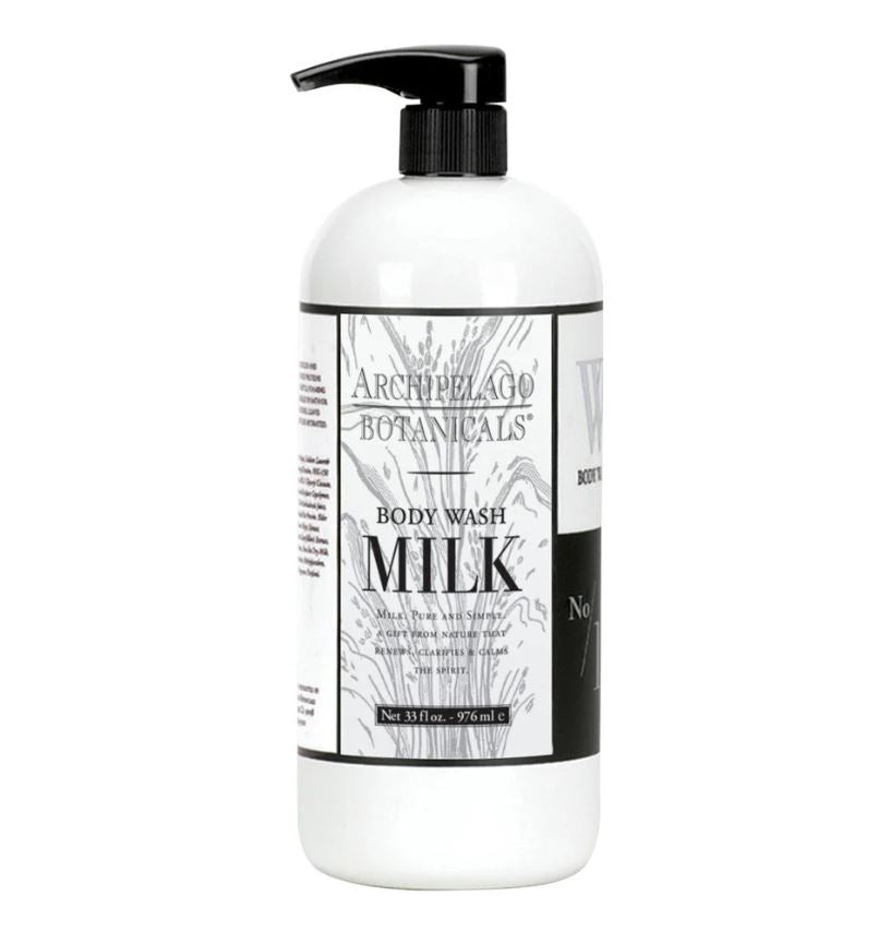 Product photograph of Archipelago Botanicals Milk Body Wash in a white bottle featuring a sleek black pump dispenser, intricate botanical line art, and a thirty-three fluid ounce label design