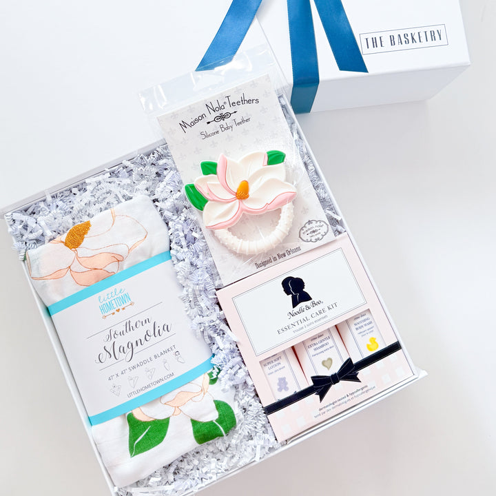 Gift set with a blue ribbon on a white background