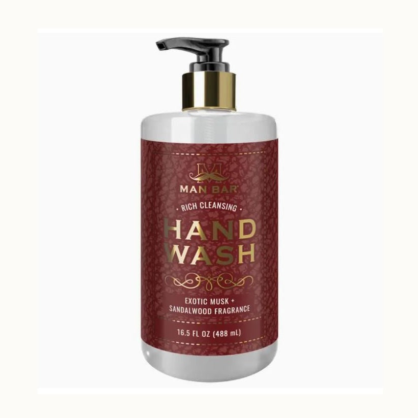 Product photograph of a San Francisco Soap Company Man Bar hand wash bottle on a plain white background featuring a deep red faux-leather textured label with an iconic gold mustache logo and a black pump with a gold metallic collar