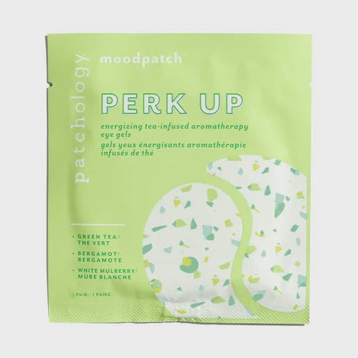 Product photograph by Patchology of Perk Up moodpatch eye gels on a light gray background featuring lime green packaging and white eye patches with a green and yellow terrazzo pattern