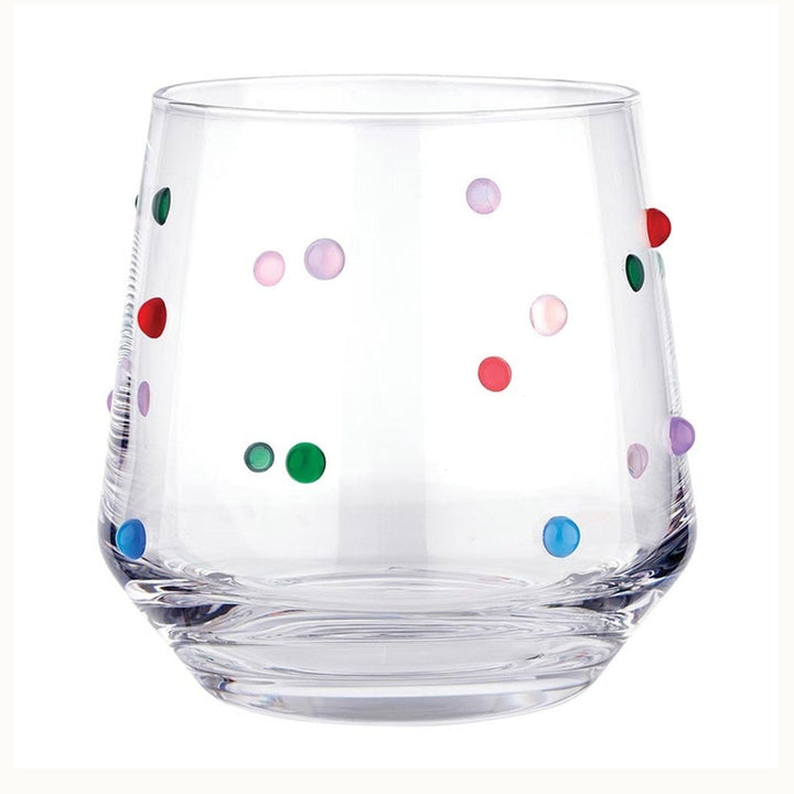 Hand-blown glass stemless tumbler centered on a white background featuring vibrant raised multicolored glass dots in shades of pink, green, and blue with a thick weighted base