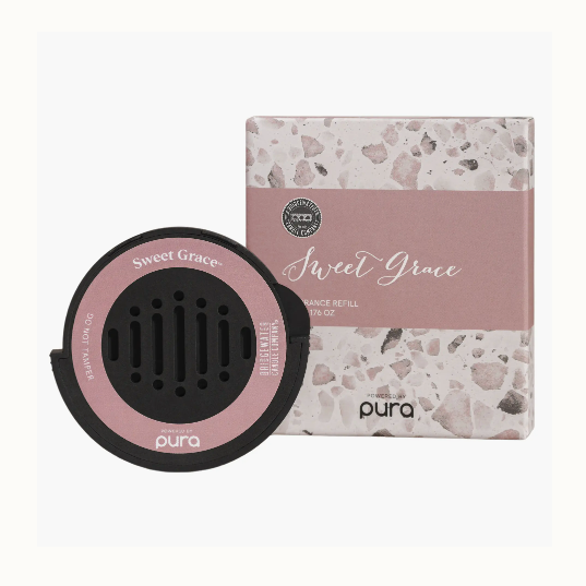 Digital product photograph by Pura and Bridgewater Candle Company of a Sweet Grace fragrance refill and packaging in a studio setting showcasing the Pura logo, a pink speckled terrazzo pattern, and elegant white cursive script