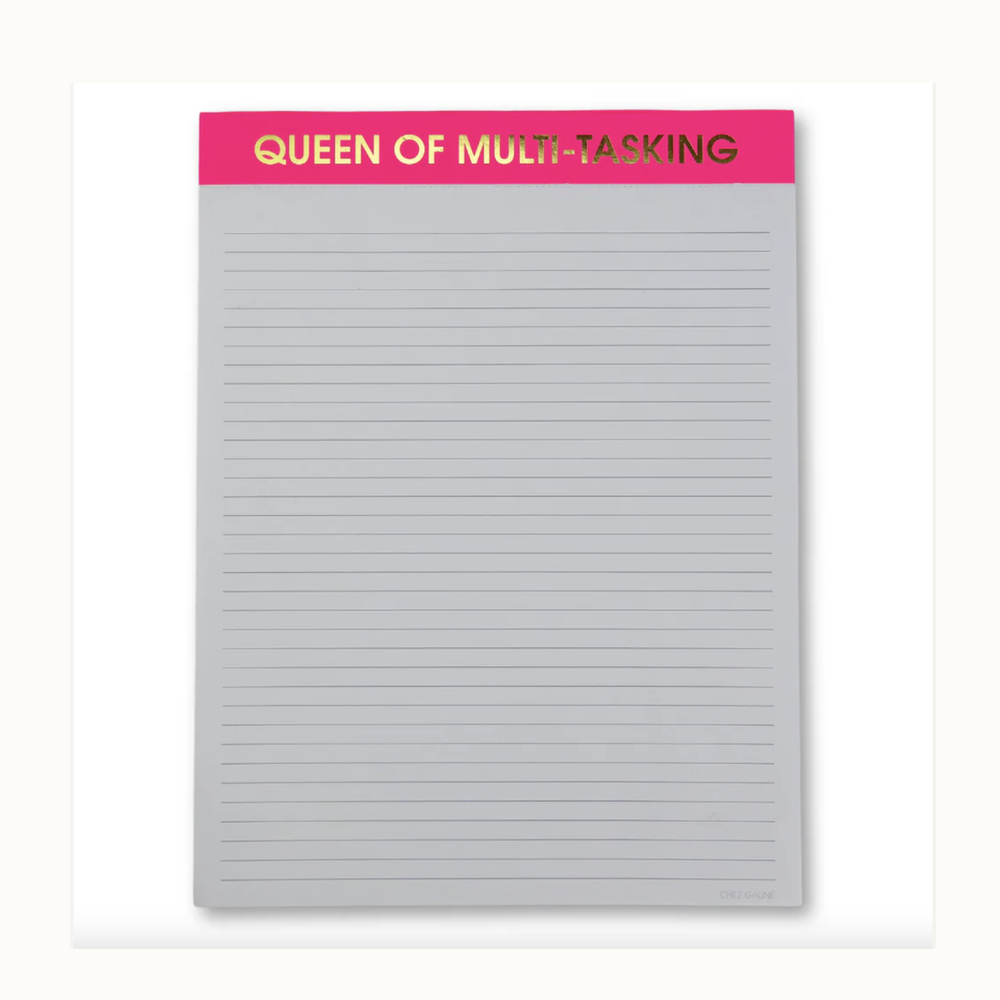 Lined notepad by Chez Gagné featuring a neon pink header with gold foil lettering reading Queen of Multi-Tasking and thin gray horizontal lines on a white background
