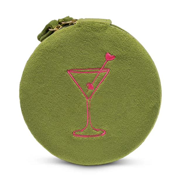 Olive green velvet round jewelry pouch featuring a pink embroidered martini glass with a heart-tipped stirrer and gold-tone zipper hardware centered on a white background
