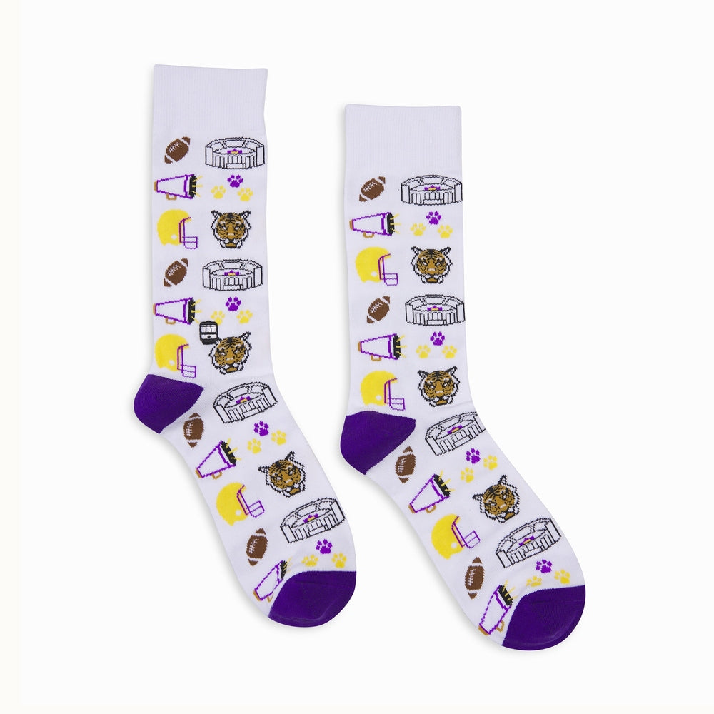 Graphic knitted crew socks featuring LSU Tigers motifs and the iconic Tiger Stadium in Baton Rouge, decorated with fierce tiger heads, yellow football helmets, and purple and gold paw prints